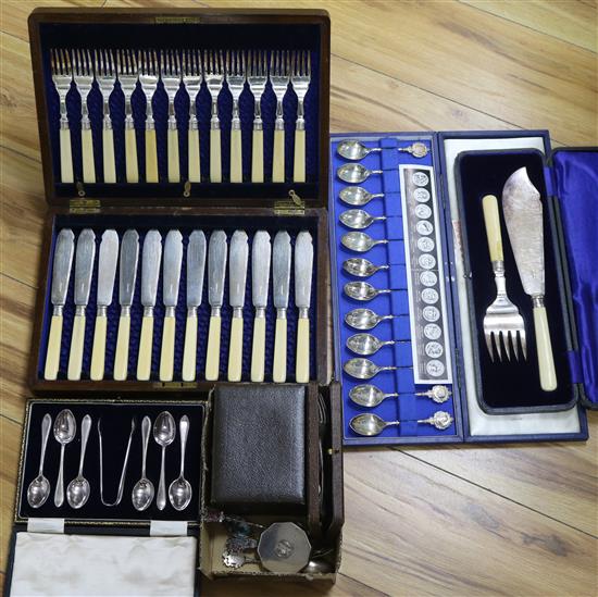 A cased set of silver spoons, silver compact, silver penknife, two other cased silver sets and three cases plated sets.